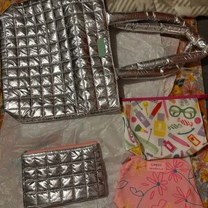 4 Clinique makeup bags/ tote